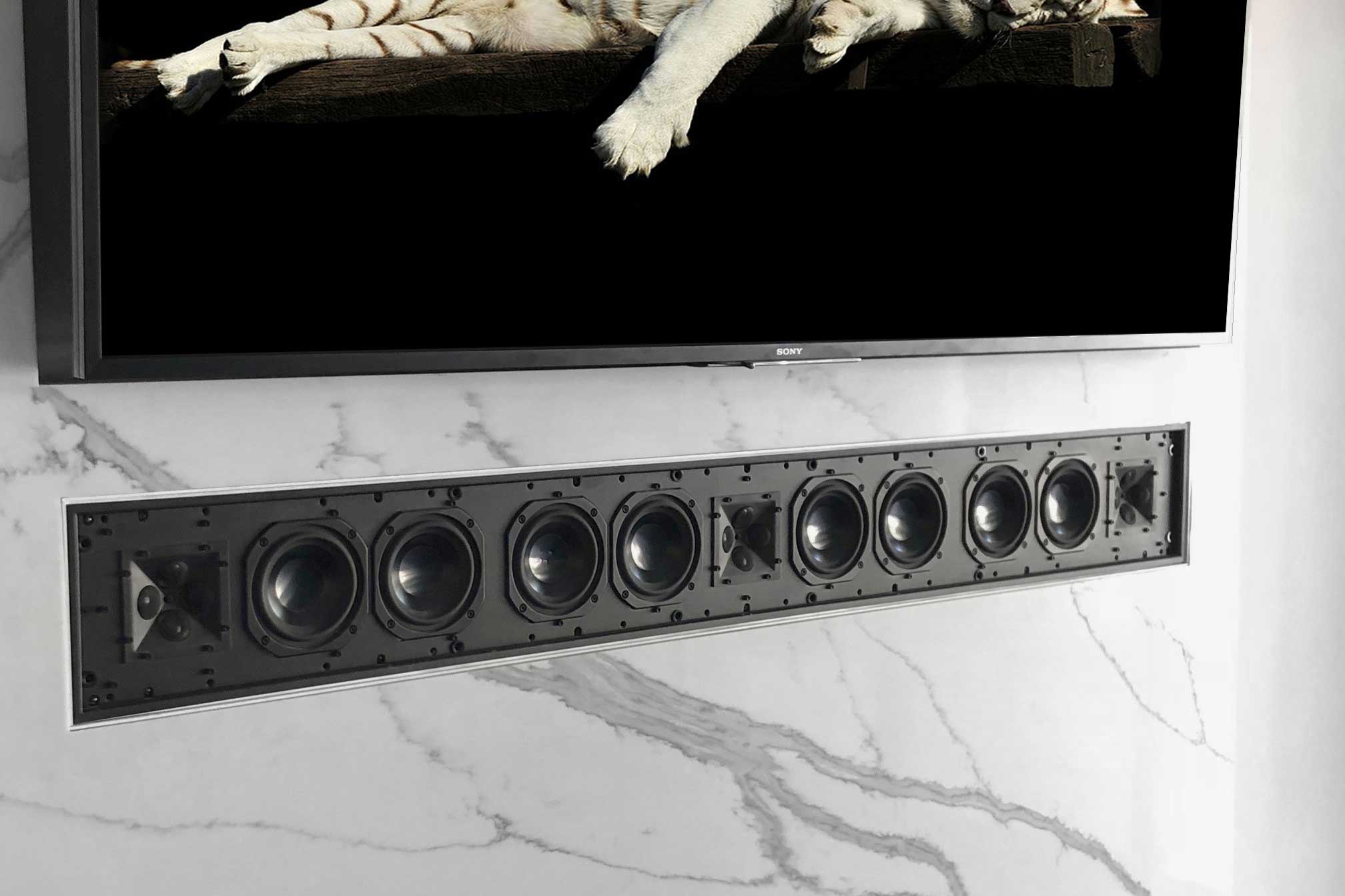 Sound bar mounted below TV