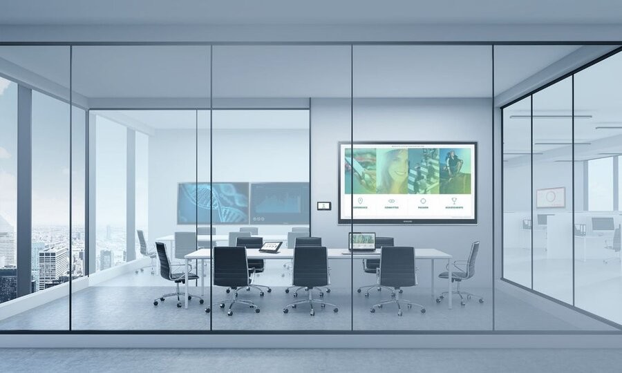 Several conference rooms featuring Crestron displays and solutions