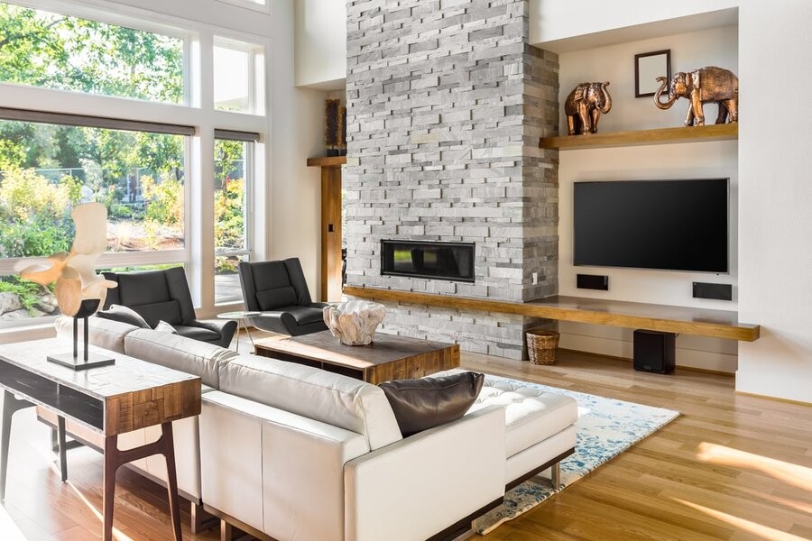 A living room space featuring smart home technologies and fixtures.